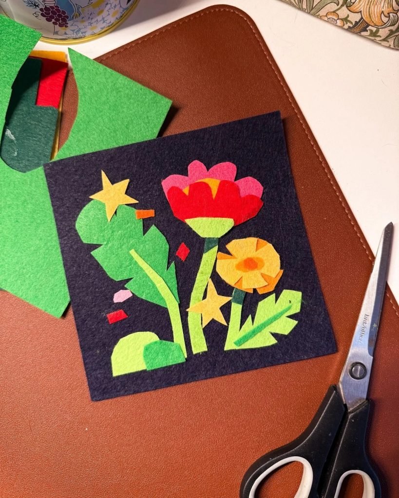 Cutting felt shapes for textile art collage during gentle embodied creative workshop Lisbon