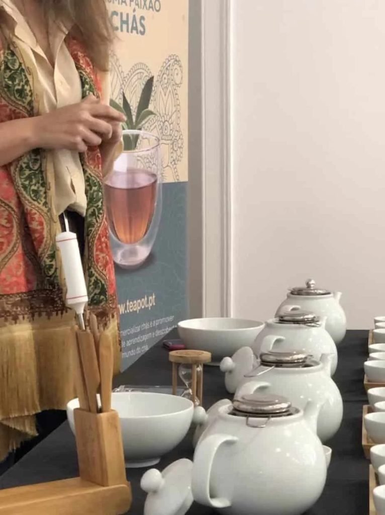 Four cups of different Indian teas arranged for guided tasting workshop experience