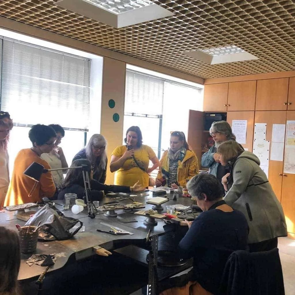 Students learning jewelry soldering technique during comprehensive 33-hour metalworking course Porto