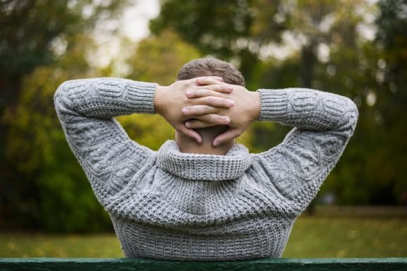 Calm person in meditation pose during anxiety relief breathwork session Lisbon 2026