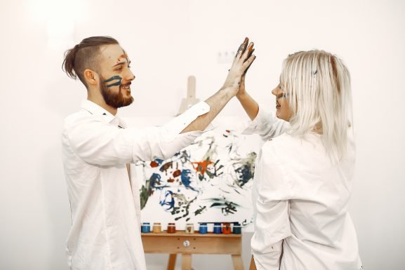 Couples creating together during romantic anniversary workshop hands-on experience Lisbon