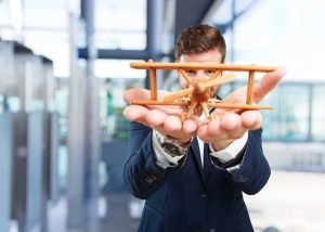 Young professional preparing for career change portfolio workshops learning design and photography skills Portugal 2026